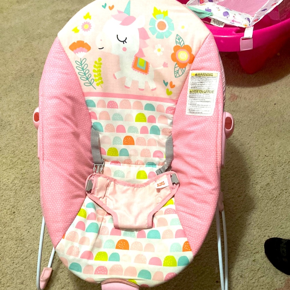 Pink vibrating baby chair